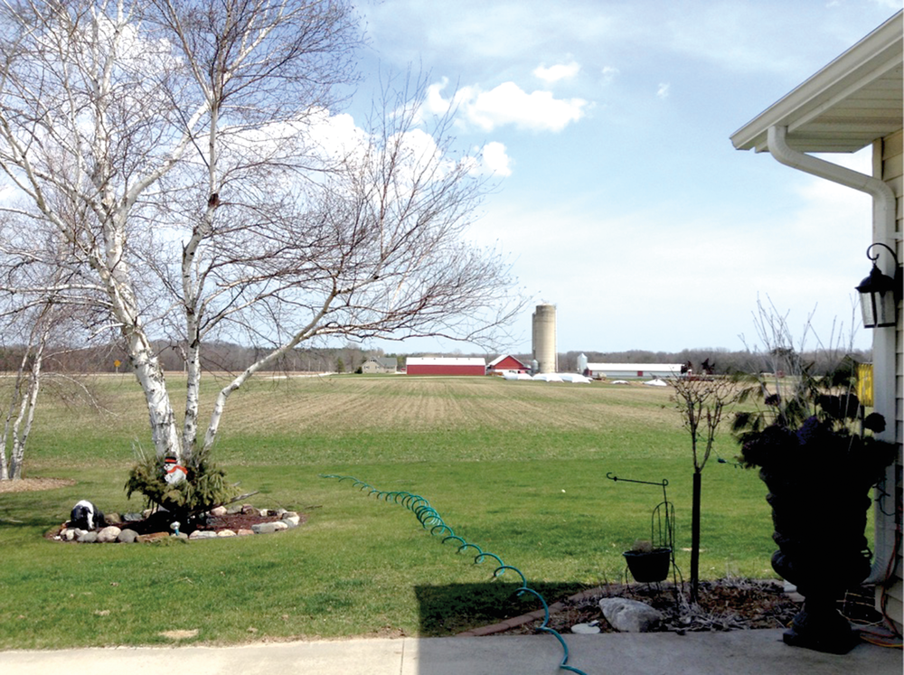 Sampling groundwater from a private well in Kewaunee County, WI, in 2016. Photo by Joel Stokdyk.