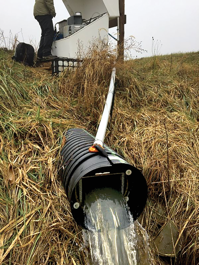 A tile drain outlet in Ohio where USDA-ARS scientists measure wa- ter quality. Photo by Jed Stinner, USDA-ARS.