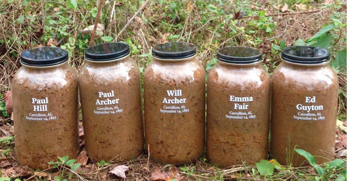 Jars of soil from the Memorial for Peace and Justice containing soil from the sites of lynching victims. Photo courtesy of the Equal Justice Initiative. 