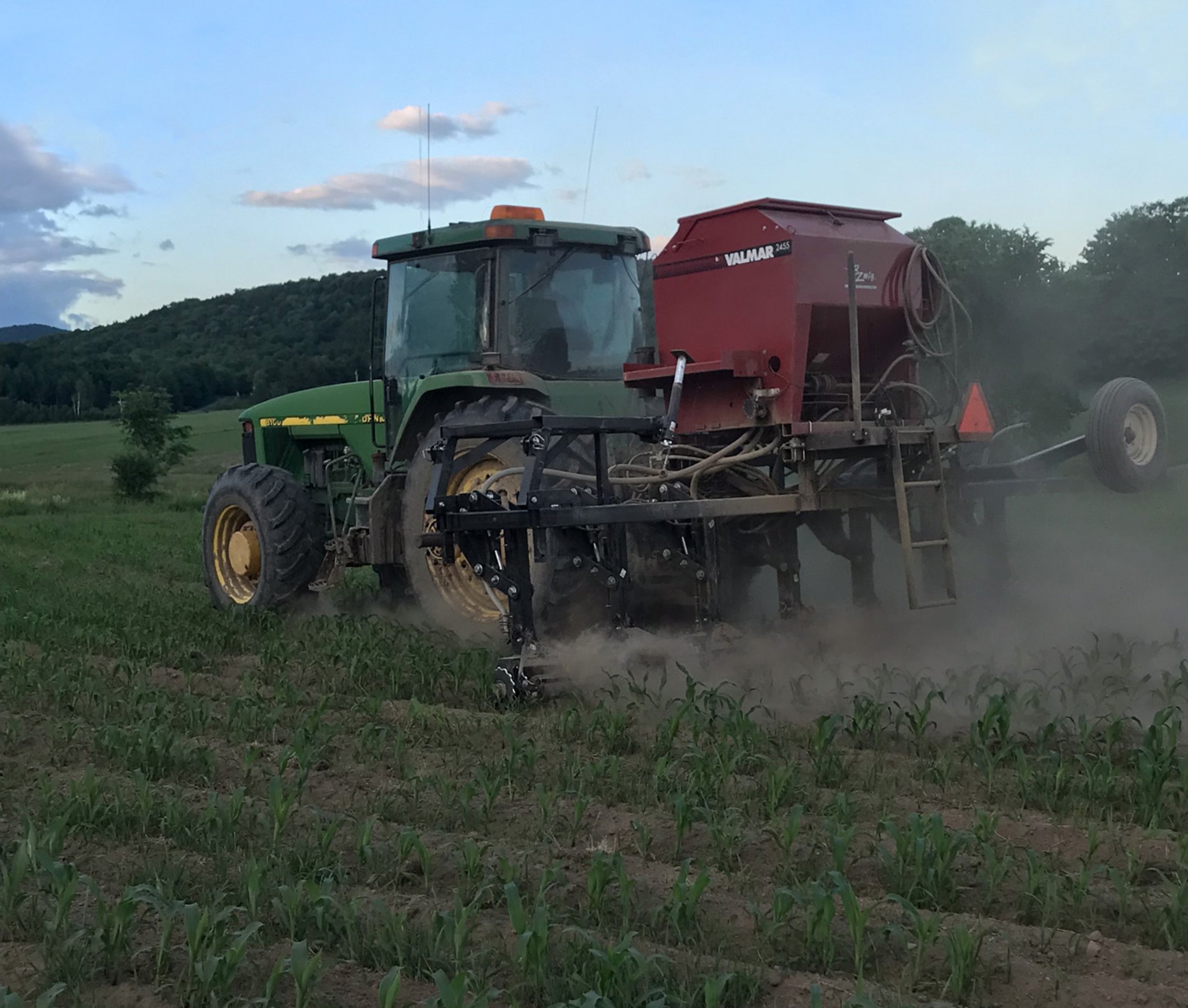 Seeder planting cover crops into standing corn. Photo by Jeff Sanders.