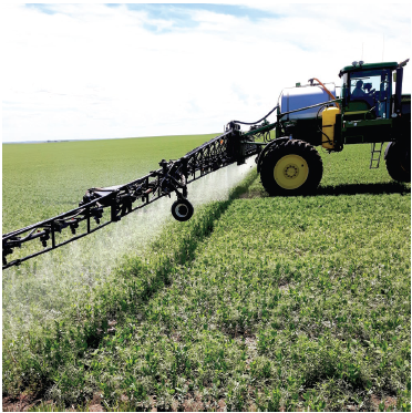 Figure 2. Spray application of a suspension of fine elemental S particles (Sulgro 70). Photo courtesy of Murray MacKinnon, Sultech.