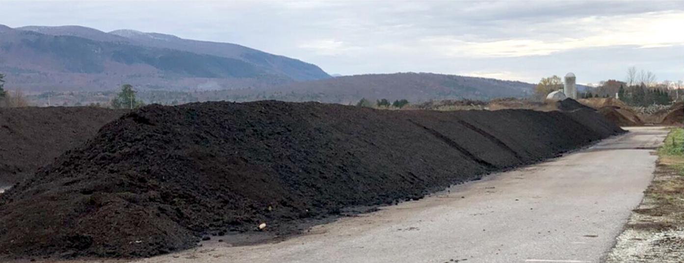 The composting process involves transforming organic waste into nutrient-rich compost through controlled decomposition.