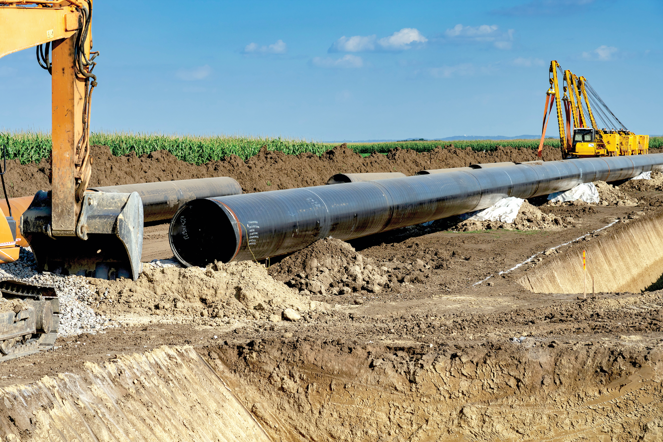 Pipeline Installation on a farm. Photo courtesy of Adobe Stock/RGtimeline.