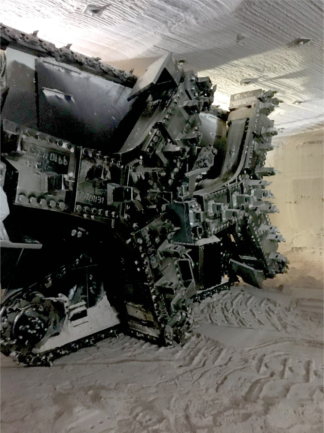 Mining machine used to grind ore from the solid potash rock in a  mine. Ore is then transported to elevators and brought to the sur- face for processing into fertilizer. Photo courtesy of Alan Blaylock.