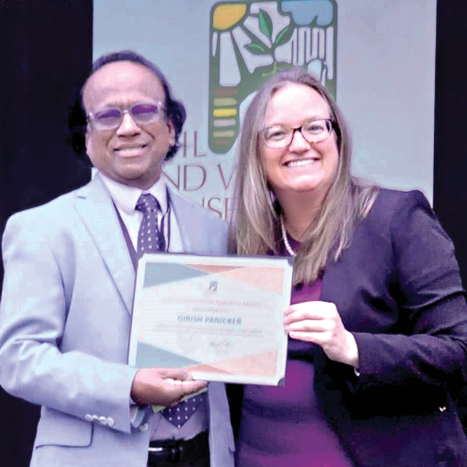 Dr. Girish Kumar Panicker receives the 2023 Conservation Research Award from the Soil and Water Conservation Society.