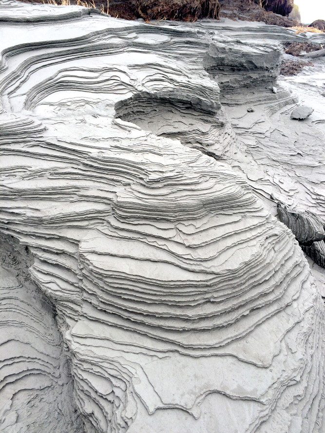 Water reworking outwash alluvium in the Cook Inlet of Alaska. Photo by David Weindorf.