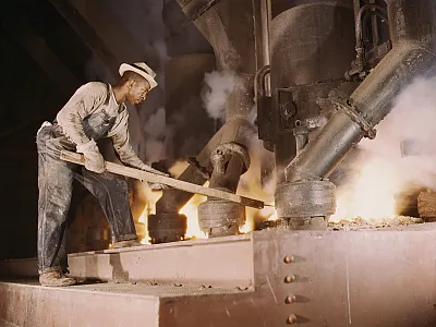 A large electric phosphate smelting furnace used to make elemental phosphorus in a TVA chemical plant near Muscle Shoals, AL in 1942. Source: United States Library of Congress.