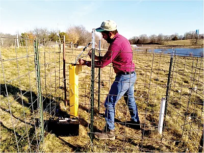 First author Miguel Salceda-Gonzalez flushes a well before collecting a groundwater sample. Photo by Gisselle Vargas-Hernandez.