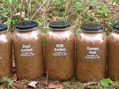 Jars of soil from the Memorial for Peace and Justice containing soil from the sites of lynching victims. Photo courtesy of the Equal Justice Initiative. 