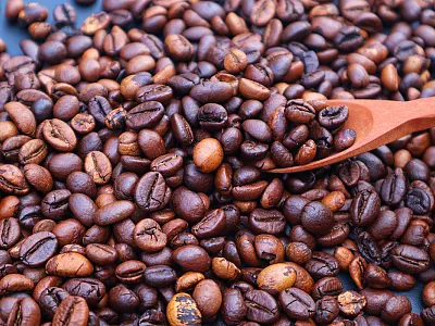 Robusta coffee beans make up a large portion of the global coffee market, yet they are relatively understudied. Photo courtesy of Adobe Stock.