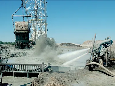 Phosphate ore is converted to a slurry with high-pressure water  cannons and pumped to a plant for refining and fertilizer produc- tion. Photo courtesy of Alan Blaylock.