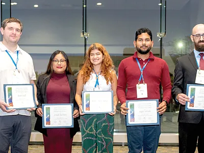 2022 Bridge Scholars (l to r): Charles Bush (Oglala Lakota College), Natalia Espinoza (University of Georgia–Athens), Robert Hall (University of Wisconsin Madison), Araceli Martinez (Columbia Basin College), Rebecca Sarai Monge (Stanford University), Miguel Salceda (University of Missouri), Leandro Otavio Vieira-Filho (University of Florida), Cesar Zamora (Oregon State University), and Karina Morales (University of Wisconsin–Madison and Chair, Bridge Scholars Program). Photo courtesy of Remsberg.