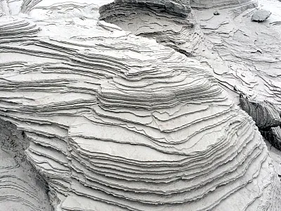 Water reworking outwash alluvium in the Cook Inlet of Alaska. Photo by David Weindorf.