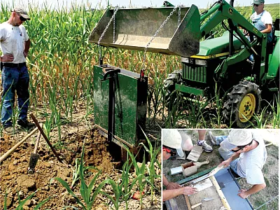 Justin Dillon (formerly of Penn State, now with Corteva Agrisciences) supervises the removal of a monolith soil sample by Dave Otto of USDA-ARS from corn where dairy manure injection had occurred. Inset: Lou Saporito (left) and Pete Kleinman of USDA-ARS use special tools to remove soil samples from the larger monolith sample. Photos by Robert Meinen.
