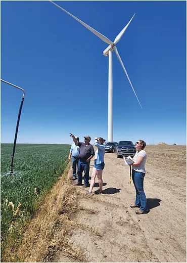 Staff at the Groundwater Management District 4 (GMD 4) in Kansas routinely visit with growers to work on groundwater monitoring and irrigation issues to reduce the pull on the Ogallala Aquifer. Photo courtesy of GMD 4.