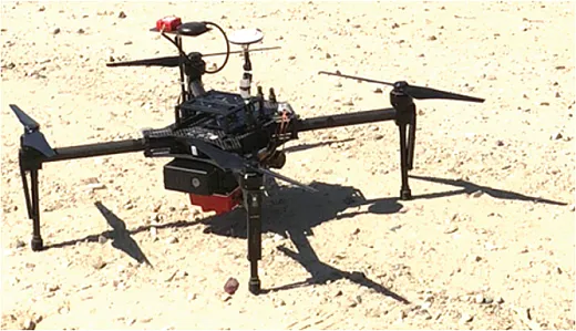 Figure 3. Matrice 100 UAV equipped with the RedEdge-M camera.