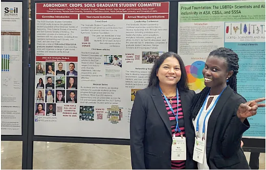 Mala Ganiger (left) and Emmanuella Owusu Ansah, members of the Graduate Student Committee, next to the committeeâs poster at the ASA, CSSA, and SSSA Diversity, Equity, and Inclusion Committee Showcase at the 2022 Annual Meeting in Baltimore.