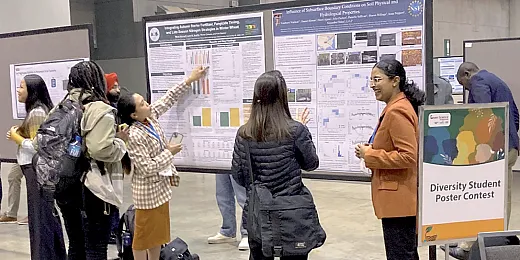 Diversity Student Poster Contest finalist Vaishnavi Varikuti presents a poster.